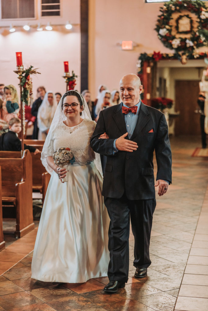 Latin-Mass-Wedding-Bride-Walking-Down-Aisle